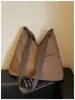 Bolso grande casual para mujer, nuevo diseño de moda otoño e invierno 2026, bolso de tela, bolso de hombro, gran capacidad, adecuado para la escuela y el trabajo, bolso cruzado