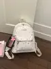 Mochila Linda de Estrellas 2025 Estilo Nuevo Bolso para Mujer Moderno Tendencia Estudiante Viaje Diario Mochila Casual Gran Capacidad Mochila Escolar