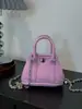 Elegante bolso llavero para mujer, nuevo modelo 2026 mini bolso de hombro cruzado, bolso de cadena de moda para labiales