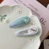 Novo clipe BB azul doce sal marinho versátil transparente em formato de coração para franja de crianças, acessório de cabelo com laço lateral para meninas