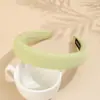 Versión coreana de diadema de chica dulce Joker color sólido lino retro diadema todo incluido alta gama diadema superior craneal al por mayor