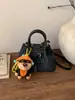 Bolsa Exclusiva de Nicho de Ombro Único para Mulheres 2026 Nova Vintage Versátil Bolsa Mãe-Filha Bolsa Transversal Bolsa de Mão Fashion Bolsa Saco