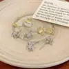 Conjunto de Brincos Stud Estrela Coração Zircônia Brilhante Estilo Cool Personalidade para Mulheres Agulha de Prata Elegante Ouro Brilho Luxo Brincos