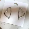 Aretes Elegantes Casuales de Corazón y Cruz Aretes de Nicho de Alta Gama 2025 Nuevos Aretes de Diseño de Nicho en Forma de Corazón