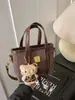Bolso Tote de Lujo de Nicho para Mujer 2025 Nuevo Bolso de Mano Bolso Cruzado al Hombro Bolso Cubo Un Solo Hombro Cruzado Elegante