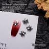Joyas de uñas de ganchillo populares en línea 2023, nuevo estilo punk oscuro, decoración de uñas de aleación con incrustaciones de diamantes y forma especial.