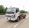 Camión de Basura Dongfeng Small Dolica con Brazo de Gancho Cuadrado de 6 Toneladas Oferta del Fabricante Estándar Nacional de Emisiones VI