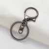 Hebilla redonda de dragón hebilla de langosta juego de tres piezas cadena de cuatro secciones ferretería DIY figura metálica cadena de 8 llavero colgante de muñeca accesorios