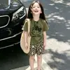 Conjunto Nuevo para Niñas 2026 Verano Infantil Lindo Elegante Dibujos Animados Estampado de Gato KT Camiseta Pantalones Cortos Casuales Conjunto de Dos Piezas