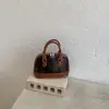 Bolso bandolera de charol brillante para mujer con estampado de piel de serpiente, nuevo 2026, elegante, para el hombro, bolso de mano tipo concha