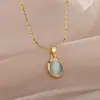 Colar de Aço Titânio com Pingente Oval Olho de Gato Venda Quente Transfronteiriça Design de Nicho Corrente para Clavícula de Luxo Leve Sentido Avançado Atacado