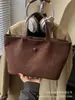 Bolso Tote de Gamuza de Gran Capacidad para Mujer 2025 Nuevo Bolso de Mano Trendy de Alta Gama para Salir a Trabajar y Bolsa para Desplazamientos