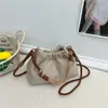 Bolso de mano cruzado para mujer 2026 nuevo verano casual moda viajero hombro axila bolso bandolera cubo