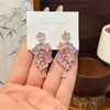 Salão de Jade Ouvindo a Primavera: Novos Brincos Clássicos Estilo Chinês Flor de Abóbora, Design Longo, Brincos de Estilo Nacional de Luxo Leve de Nicho, Galvanizado a Cobre