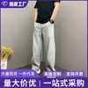 Pantalones casuales de color marrón melange de tiro alto para hombre, estilo callejero americano, adecuados para primavera y otoño, con un diseño ligeramente acampanado y pierna recta.