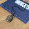 Bodhisattva Kinnamoroll Madera de Agarwood Madera Preciosa Colgante Relieve Unilateral Artesanía Tallado Fino Adorno Cadena para Suéter