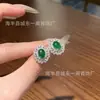 Venta al mayoreo del fabricante: Aretes ovalados de jadeíta natural, con un vibrante tono verde, engastados en plata S925, en un nuevo estilo chino, versátiles para mujer