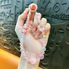 Juguete de Apilamiento con Mini Figuras Cadena para Teléfono con Cuentas Llavero Colgante Versátil Exquisito para Bolsa Muñeco Máquina Regalo Pequeño Venta al por Mayor