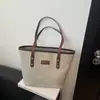 Bolsa Satchel Popular de Grande Capacidade para Outono e Inverno, Bolsa de Trabalho para Mulheres 2025 Nova Luxo Acessível Veludo de Pele de Veado Bolsa Tote de Ombro Único