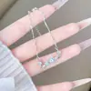 Pulsera de nomeolvides para mujer, lujo ligero, exquisita, diseño de nicho, temperamento dulce, fresca, moderna, de alta gama, accesorio de mano versátil