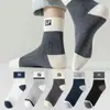 Calcetines para adolescentes, forrados de algodón, de longitud media (hasta la pantorrilla), negros y blancos, modernos, con letras, transpirables, estilo otoño/invierno