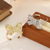 Anillo de lazo de diamantes de lujo ligero de Dongdaemun coreano para mujer, exquisito diseño de nicho de moda que combina con todo.