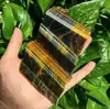 Venda Quente Transfronteiriça Pedra Bruta de Cristal Natural Bastão Polido Olho de Tigre Amarelo e Azul Decorações de Ornamentos para Mesa de Escritório em Casa Atacado