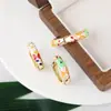 Aretes de anillo de flor gota de aceite mariposa con baño de oro de 18k diseño de nicho aretes transfronterizos europeos y americanos para mujer al por mayor