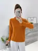 Camiseta de otoño e invierno estilo francés con volantes y cuello alto medio, corte ajustado, manga larga, diseñada para ser una capa base elegante para mujer