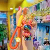 Resina de dibujos animados galvanizado colorido llavero de conejo espacial para auriculares colgante de joyería para bebé mochila para auriculares Accesorios de conejo