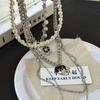 Collar de perlas multicapa con costuras de estilo barroco para mujer, estilo europeo y americano, cadena de clavícula de alta gama que combina con todo, a la moda.