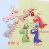 Llavero de Dinosaurio de Dibujos Animados Colgante para Bolso de Piel PU Llavero de Campana de Cuero Personalizado Llavero de Coche Colgantes de Regalo