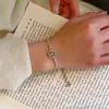 Pulsera de Camelia Negra con Circonita Estilo Chanel para Mujer, Diseño Exquisito de Lujo Ligero de Nicho, Pulsera Ajustable, Nuevo Modelo 2026