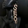 Pendientes de botón de cadena estilo europeo y americano, pendientes de alta gama de moda, pendientes personalizados, diseño de nicho, dulces, geniales, nuevos, pendientes populares