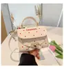 Bolso Cuadrado Pequeño Estilo Coreano de Nicho 2026 Nuevo Lunares Moda Versátil para Viajes Diarios Mini Bolso de Mano Cruzado Bolso para Niños