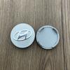 Adecuado para cubierta de cubo de rueda Hyundai Yuedong 60MM plomo IX35 Santa Fe cubierta central de neumático cubierta estándar para coche estándar