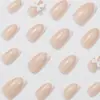 Nueva Manicura Transfronteriza Europea y Americana, Blanco Dulce y Sencillo Francés con Lazo, Tez Aclaradora, Uñas Portátiles de Longitud Media al por Mayor