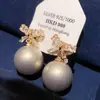 Pendientes Redondos Plegados con Borlas Tachonados de Pedrería Estilo Retro Europeo y Americano, de Moda y Versátiles, con un Toque de Lujo Ligero y de Alta Gama