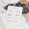 Nuevos pendientes de moda europeos y americanos para mujer, frescos, sencillos, pequeños y exquisitos, una semana de 6 pares de pendientes al por mayor