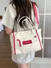 Bolso de lona transfronterizo 2026 nuevo, estilo ins, de alta gama, gran capacidad, para viajes y uso diario, de hombro/cruzado