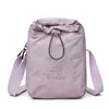 Bolsa Transversal Multifuncional Elegante e Simples para Copo de Água Nova Coleção Verão 2025 Bolsa para Casal Bolsa de Ombro Portátil para Viagem