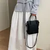 Bolsa de mano de color liso de verano 2026 transfronteriza, bolso casual para teléfono móvil de mujer, bolso de hombro cruzado simple para el trabajo