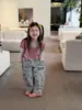 Conjunto de Niña 26 Otoño Nuevo Estilo Coreano Camiseta Rayada con Estrellas en Capas y Pantalón Cargo de Dos Piezas para Niños Mayores