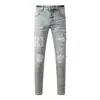Marca europea y americana de alta costura transfronteriza AMR marca de moda callejera hiphop jeans ajustados skinny rotos y parcheados para hombre