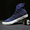 Tênis de Lona de Cano Alto Novos para Primavera e Outono Estilo Coreano Tendência Casual Calçados Masculinos Jovens Versáteis Tênis Slip-On Planos para Homens