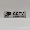 Señal de monitoreo 24 horas de suministro transfronterizo Señal de advertencia en inglés Señal de área de monitoreo de patio de territorio privado de EE. UU.
