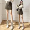 Novo design outono e inverno, minissaia de couro com cintura irregular, saia curta feminina bodycon de cintura alta