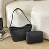 Bolso de mano de moda de nicho con patrón tejido para mujer, nuevo bolso tipo cubo estilo vintage, bolso de hombro para llevar bajo el brazo