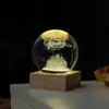 Bola de cristal personalizable grabada con láser 3D con luz nocturna emisora de luz, adorno de cristal de escritorio y decoración que realza el ambiente