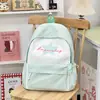 Mochila versátil de moda de verano 2026 transfronteriza, mochila estilo japonés para estudiantes de secundaria y preparatoria, ligera y de gran capacidad
